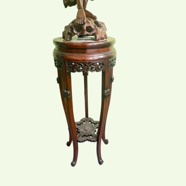 A Chinese carved hardwood lamp on stand
木雕刘海金蟾灯带座 - Image 2