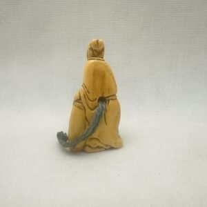 Alternative view of Z380 Japanese ivory Netsuke of an immortal
